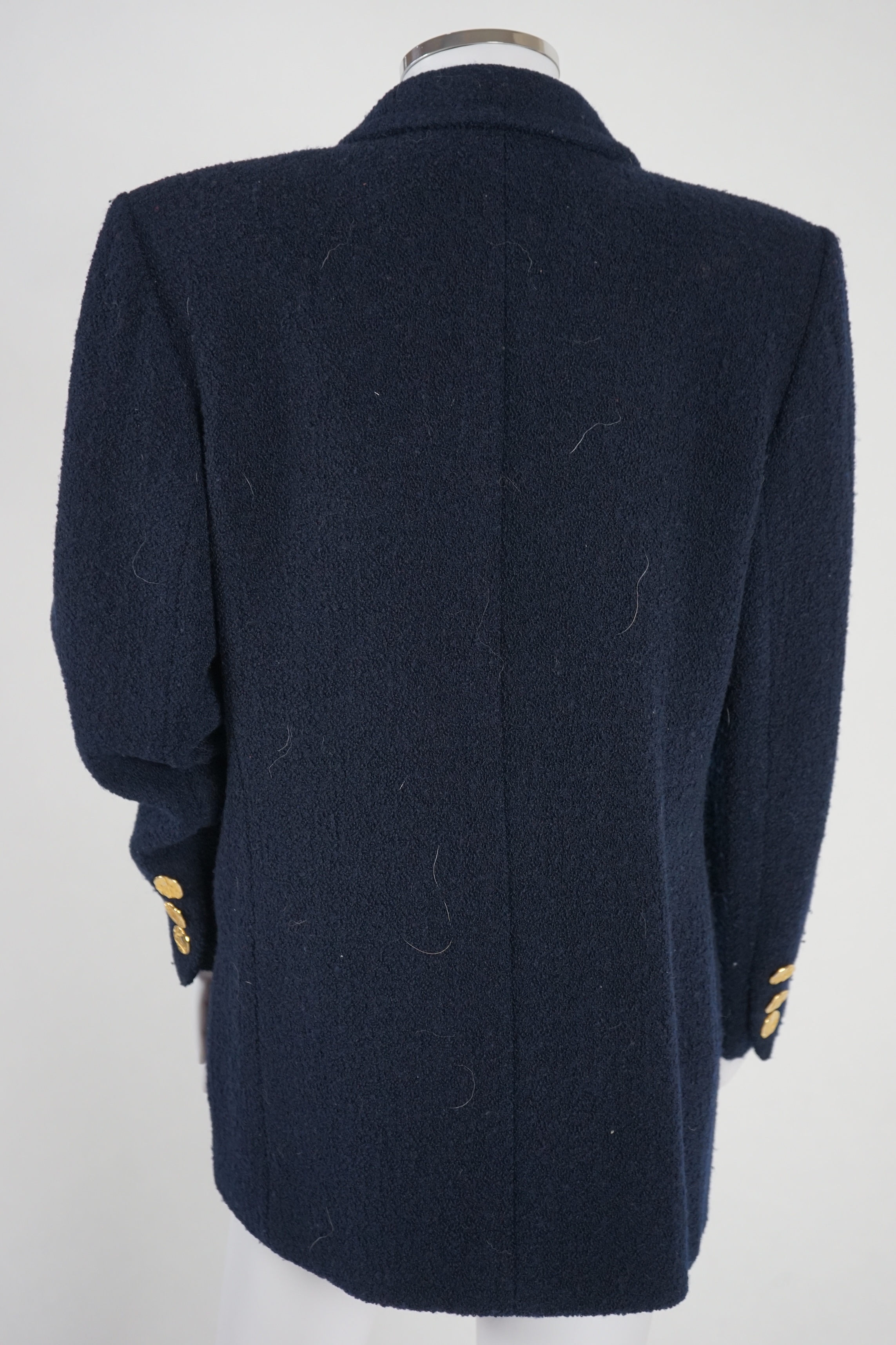 A vintage Yves Saint Laurent variation lady's navy blue wool textured blazer, F 40 (UK 12). Proceeds to Happy Paws Puppy Rescue